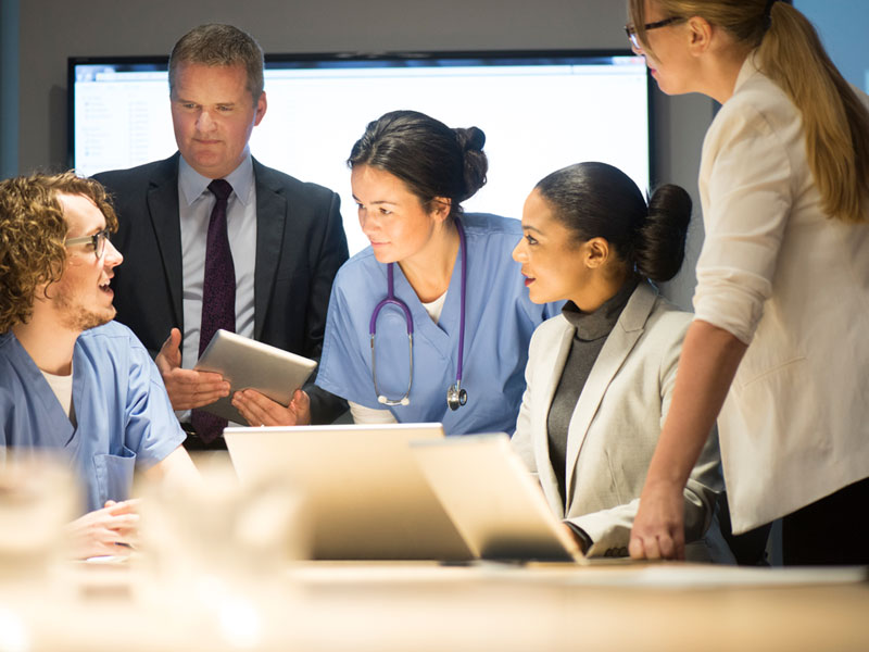 healthcare professionals meeting in a conference room